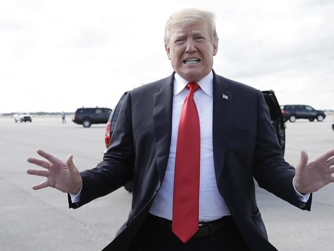 President Donald Trump boards Air Force One, Sunday, March 24, 2019, at Palm Beach International Airport, in West Palm Beach, Fla., en route to Washington. (AP Photo/Carolyn Kaster)