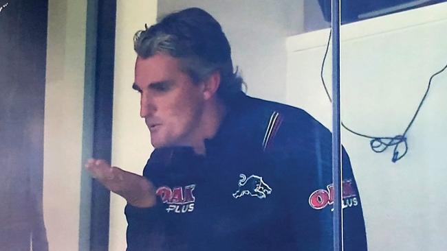 Panthers coach Ivan Cleary blows a kiss to fans after his side beat the Wests Tigers.