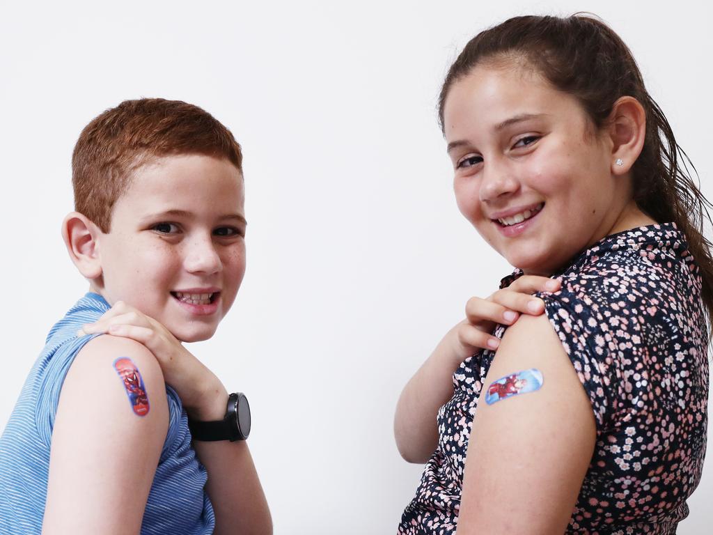 Archer Twomey, 8, and Scarlett Twomey, 10 received their first jab of the Pfizer vaccine. Picture: Brendan Radke