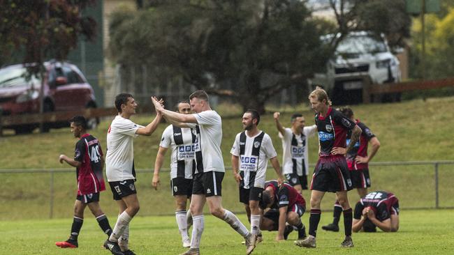 Willowburn players celebrate their win against Stanthorpe United.