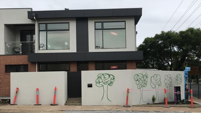 Graffiti on the wall of a townhouse development on the corner of Culross Ave and Fullarton, Myrtle Bank.