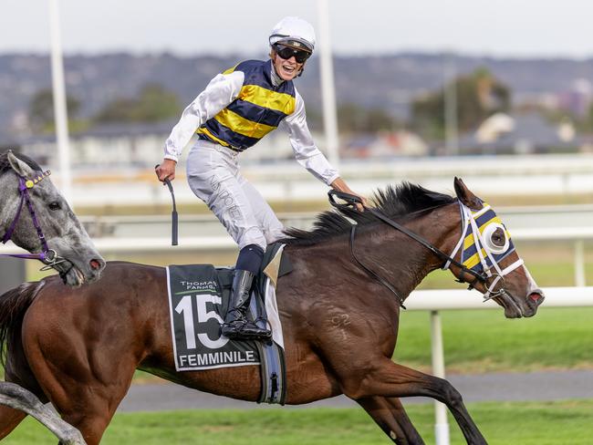 Lachlan Neindorf, aboard Femminile, celebrates winning the South Australian Derby. Picture: Makoto Kaneko