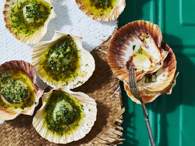 EMBARGO FOR TWAM 06 AUGUST 2022. FEE MAY APPLY Recipe by Alice Zaslavsky. Scallops on the half-shell with compound herb butter. Styling David Morgan. Photo Guy Bailey