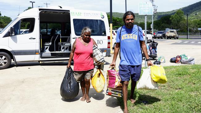 Wujal Wujal community members Cynthia Basini and Jarrett Basini arrive at the Cooktown PCYC after being evacuated from their Far North Queensland town by an Australian Army Chinook helicopter. The entire community of Wujal Wujal has been evacuated following the flood emergency, with the majority of the town staying at the Cooktown PCYC, which is set up as an evacuation centre by the Australian Red Cross. Picture: Brendan Radke