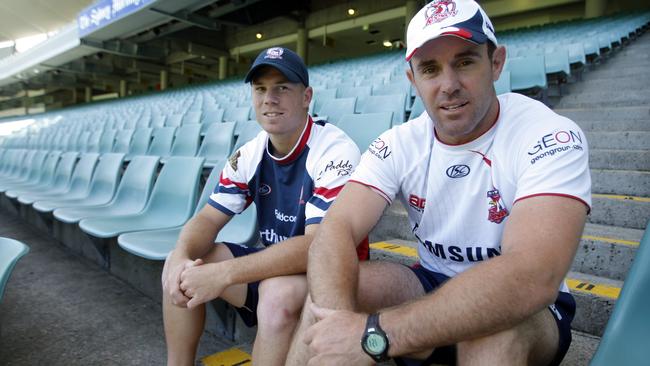 Warner with then-Roosters coach Brad Fittler in 2013.