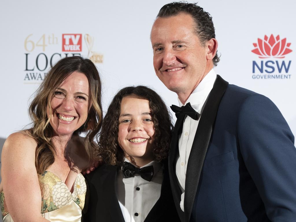 Felix Cameron, centre, poses for a photograph with his parents after winning Best Lead Actor in a Drama at the 64th Logie Awards in Sydney on Sunday 18 August. Picture: NewsWire/Monique Harmer