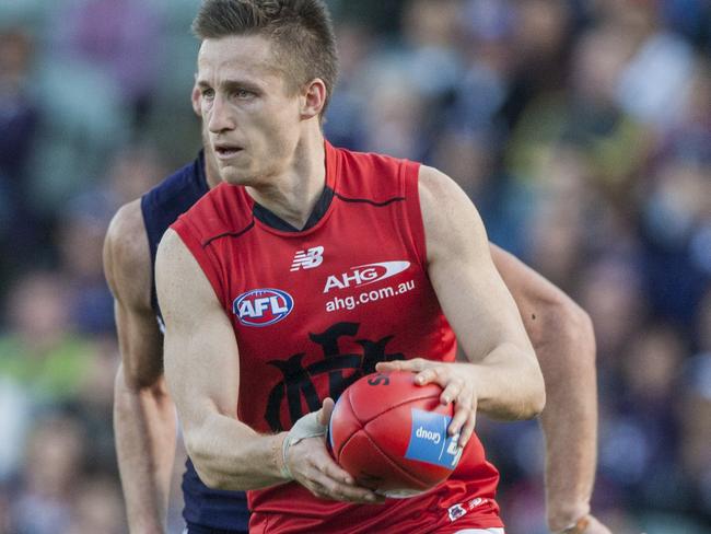 Jack Grimes for Melbourne during the round 22 AFL match between the Fremantle Dockers and Melbourne at the Domain Stadium in Perth, Sunday, August 30, 2015. Fremantle won the match 108-54.(AAP Image/Tony McDonough) NO ARCHIVING, EDITORIAL USE ONLY