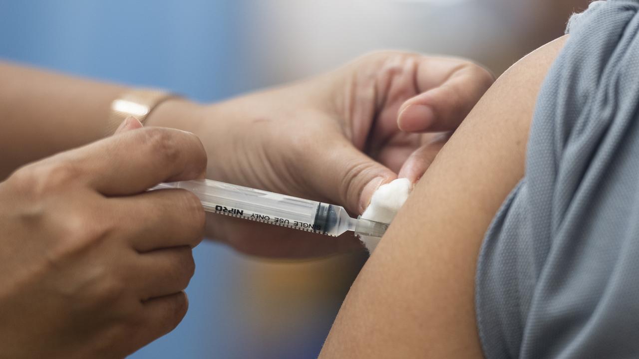 A healthcare worker administers the AstraZeneca vaccine. Picture: Sirachai Arunrugstichai/Getty Images