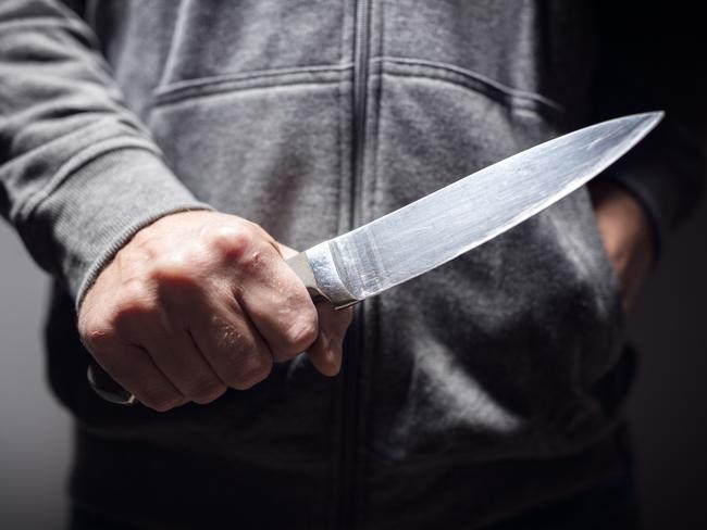 Generic crime Istock  -  Criminal with knife weapon threatening to stab