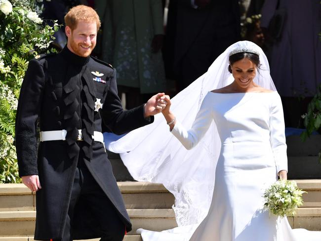 Prince Harry, Duke of Sussex and his wife Meghan, Duchess of Sussex after their wedding ceremony. Picture: AFP