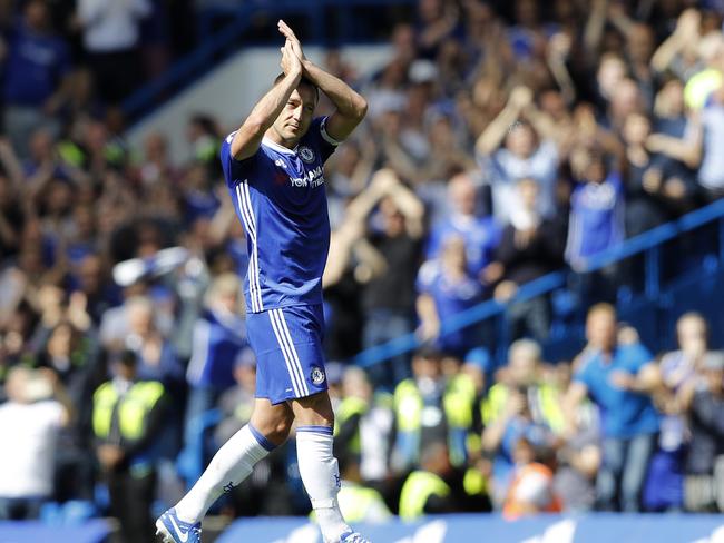 Chelsea's John Terry claps his side's fans as his is substituted off in the 26th minute