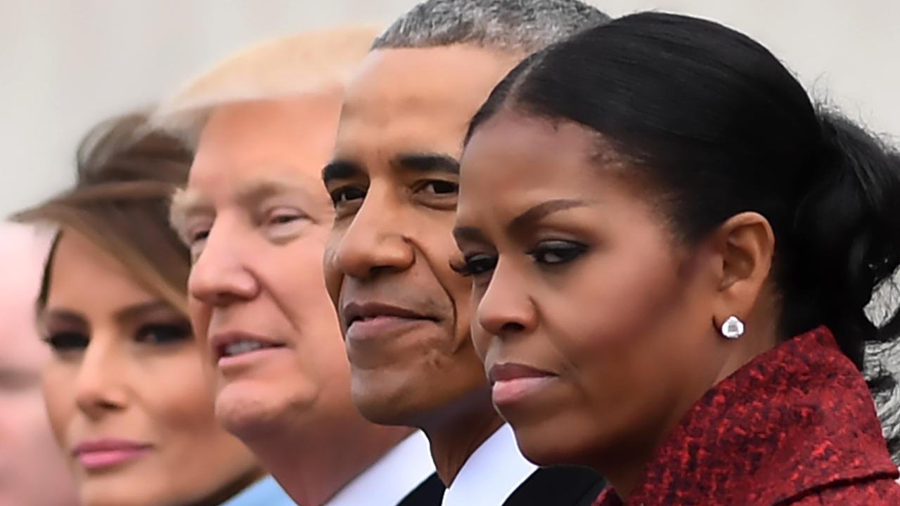 Melania Trump, President-Elect Donald Trump, former President Barack Obama and Michelle Obama at the US Capitol after Mr Trump’s inauguration in 2017. / AFP PHOTO / JIM WATSON