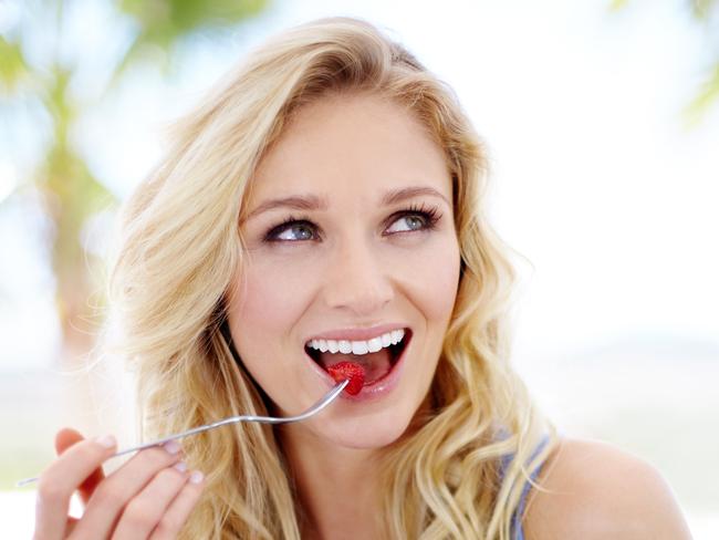 For BW Magazine 20/1 - Stock Photos: Pretty young woman enjoying her fruit salad