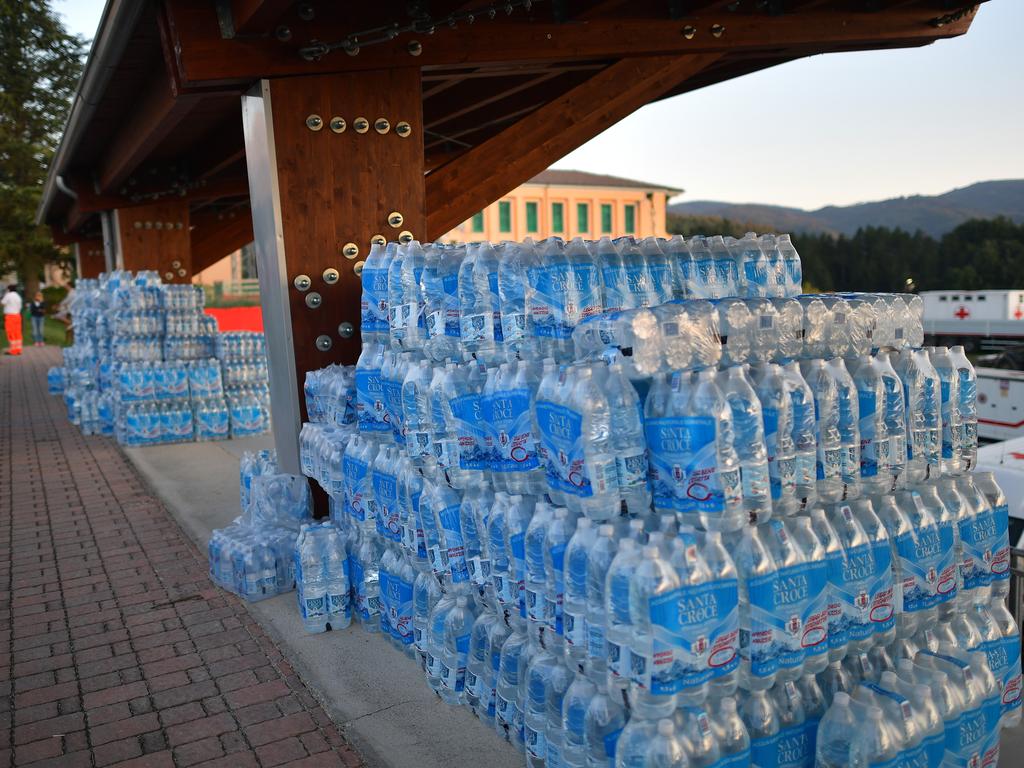 AMATRICE, ITALY - AUGUST 25: Bottled water is stored on August 25, 2016 in Amatrice, Italy. The death toll in the 6.2 magnitude earthquake that struck around the Umbria region of Italy in the early hours of Wednesday morning has risen to at least 250 as thousands of rescuers continue to search for survivors. (Photo by Carl Court/Getty Images)