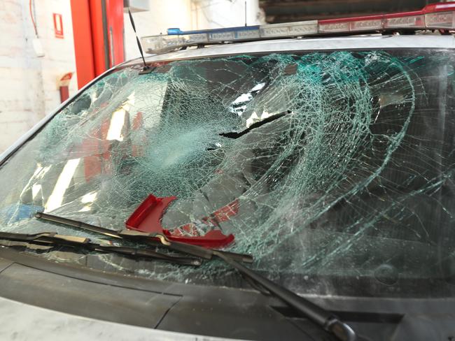 One of four police cars that were damaged when police tried to break up a party in North Melbourne last night. Sunday, April 29. 2018. Picture: David Crosling