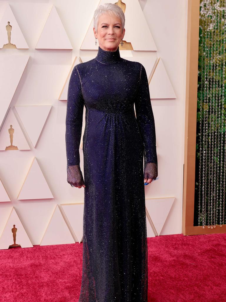 Oscars red carpet veteran, Jamie Lee Curtis, glitters in a high-necked navy gown. Picture: AFP