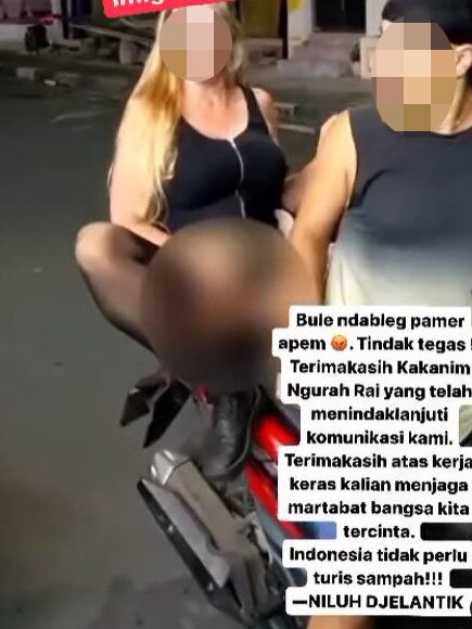 Viral footage shows her on the back of a motorbike committing the indecent act. Picture: Instagram/niluhdjelantik