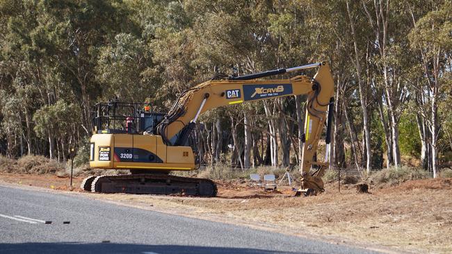 Searching continues along Arumpo Rd at Mourquong on Monday. Picture: Michael DiFabrizio