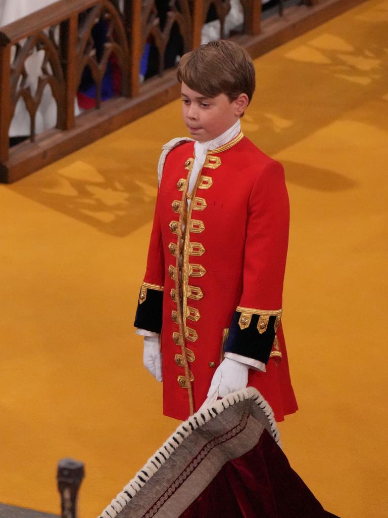 Prince George would rather be listening to AC/DC than the choral pipes during the coronation ceremony. Picture: Getty Images