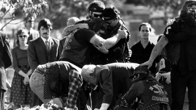 Bandidos members mourn during a funeral for their two fallen mates at Rookwood Cemetery in Sydney.