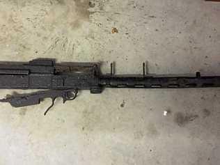 FAKE: The replica machine gun found during a search of a Yamba property last year. Picture: Bill North