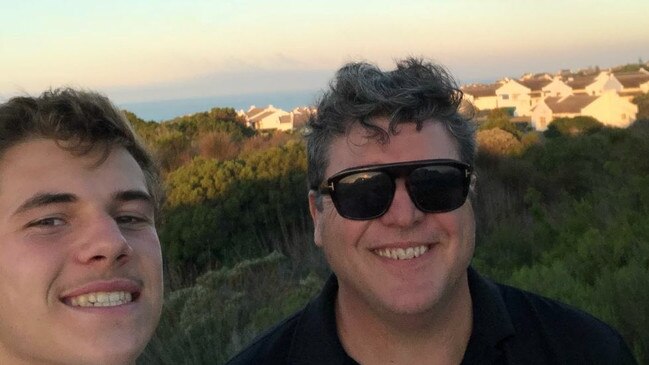 Nate and father Michael Searle on holidays