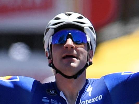 Italian rider Elia Viviani of team Quick-Step celebrates winning stage three of the Tour Down Under from Glenelg to Victor Harbor, South Australia, Thursday, January 18, 2018. (AAP Image/Dan Peled) NO ARCHIVING, EDITORIAL USE ONLY