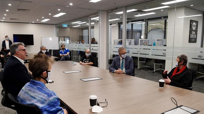 Gerard Hayes (second left) and Anthony Albanese (second right) speak with aged cared employees in Sydney. Picture: NCA NewsWire/Bianca De Marchi