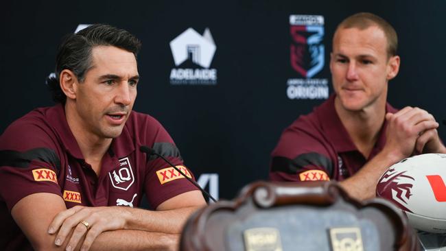 Billy Slater (left) has just extended his time with the Maroons. Photo: NCA NewsWire / Naomi Jellicoe