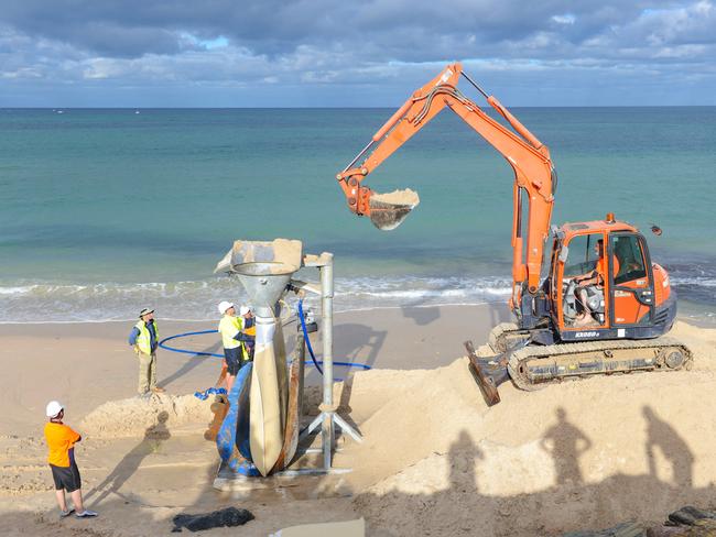 Sand bagging at Brighton Beach north of the jetty. (AAP Image/Brenton Edwards)