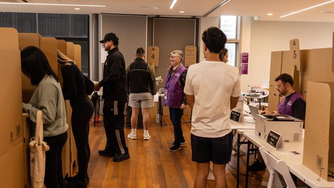 People cast their vote early for the May 3 election at a voting station in St Kilda on Saturday. Picture: NewsWire / Diego Fedele