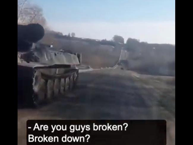 A Ukrainian driver asks stranded Russian troops if they are okay. Picture: Supplied/Twitter