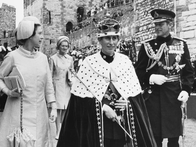 Prince Charles with Queen Elizabeth and Prince Philip, Duke of Edinburgh (right) during the ceremony of Charles' Investment as Prince of Wales at Caernarfon Castle, Gwynedd, Wales, in 1969. Picture: Dennis Oulds/Central Press/Hulton Archive/Getty Images