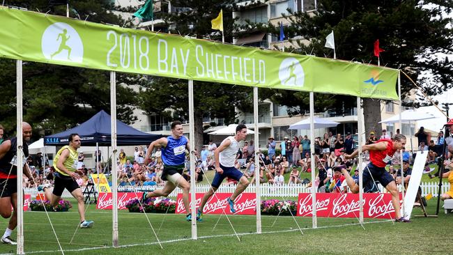 Harrison Hunt (far right in red), wining the Men's final on Friday. Picture Dean Martin