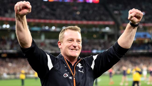 MELBOURNE, AUSTRALIA - SEPTEMBER 15: Blues coach Michael Voss celebrates after the Blues defeated the Demons during the AFL First Semi Final match between Melbourne Demons and Carlton Blues at Melbourne Cricket Ground, on September 15, 2023, in Melbourne, Australia. (Photo by Robert Cianflone/Getty Images)