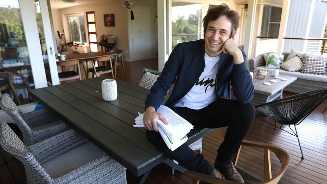 Author and journalist Trent Dalton reads an excerpt from his upcoming second novel, All Our Shimmering Skies, recorded at his home in Brisbane for Review’s Isolation Room – a video series starring top musicians, writers and artistic performers recorded at their homes. Picture: Lyndon Mechielsen / The Australian