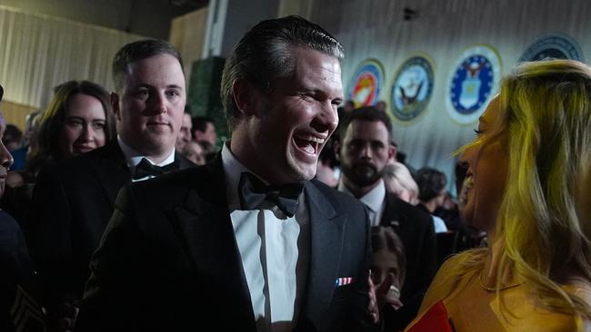 Hegseth has a laugh with a guest at the Commander-in-Chief Ball. Picture: Getty Images via AFP