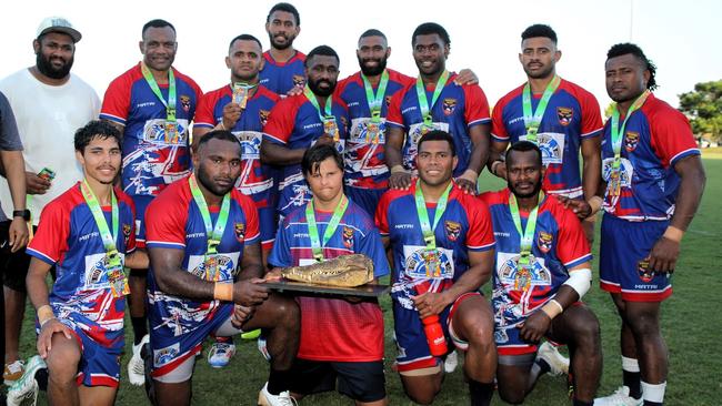 Croc champions Tabadamu Red posing with their winners trophy after their 19-14 grand final victory. Picture: From The Sidelines Photography.