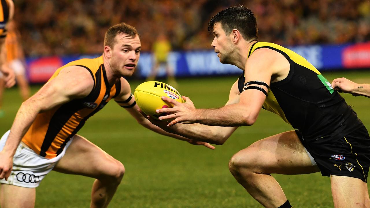Could Brownlow medallists Tom Mitchell and Trent Cotchin team up at Tigerland? (AAP Image/Julian Smith)