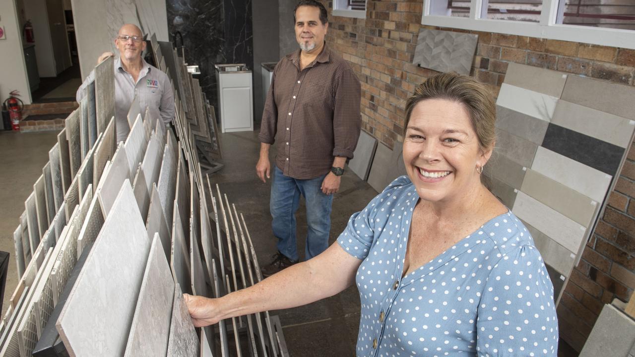 (back from left) Rod Fox and Kelly Farrell with Gilly Fowler (in front) from Ceramic and Brass in Campbell St. Picture: Nev Madsen.