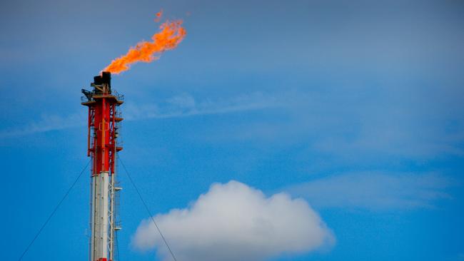 A flare stack at the Queensland Curtis Liquefied Natural Gas (QCLNG) project site in Gladstone. Picture: Patrick Hamilton/Bloomberg via Getty Images