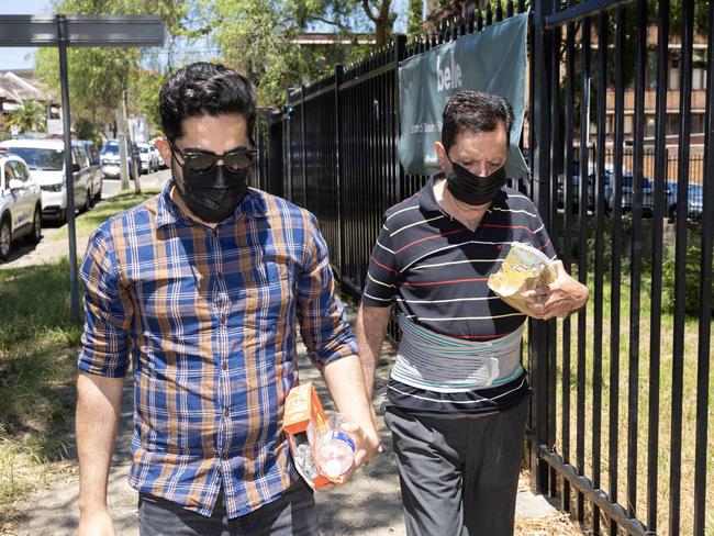 Kamal Arora (right) leaving Waverley Court. Picture: Ted Lamb