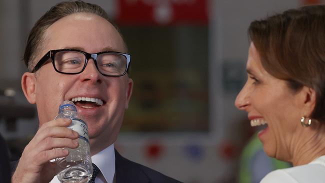 Qantas chief Alan Joyce and with his Virgin Australia counterpart, Jayne Hrdlicka. Picture: Dylan Coker