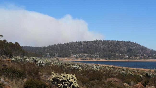 The smoke cloud from fire near Miena in the Central Highlands. Picture: LUKE BOWDEN