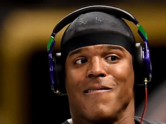 FILE - DECEMBER 9: According to reports, Cam Newton was injured in a two-car accident on Church Street bridge, December 9, 2014 in Charlotte, NC. NEW ORLEANS, LA - DECEMBER 07: Cam Newton #1 of the Carolina Panthers warms up before the start of the game against the New Orleans Saints at Mercedes-Benz Superdome on December 7, 2014 in New Orleans, Louisiana. (Photo by Stacy Revere/Getty Images)