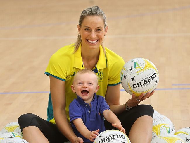 Australian Netballer Laura Geitz with her 1yr old Barney at the Australian netball camp at the Australian Institute of Sport in Canberra. Picture Kym Smith