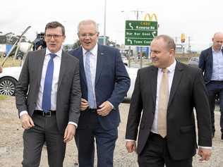 Minister for Cities, Urban Infrastructure and Population Alan Tudge (left), Prime Minister Scott Morrison (centre) and Liberal Member for La Trobe Jason Wood (right) are seen during an announcement in Melbourne, Thursday, March 21, 2019. Picture: ELLEN SMITH