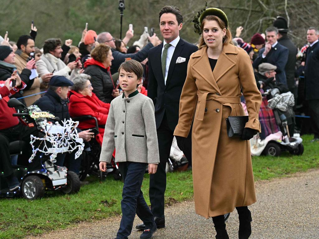 The couple with Edoardo’s eight-year-old-son, Wolfie, on Christmas Day. Picture: Oli Scarff/AFP