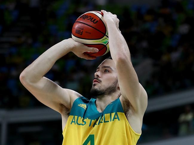 RIO DE JANEIRO, BRAZIL - AUGUST 06: Chris Goulding #4 of Australia takes a shot in the second half against France on Day 1 of the Rio 2016 Olympic Games at Carioca Arena 1 on August 6, 2016 in Rio de Janeiro, Brazil. (Photo by Elsa/Getty Images)