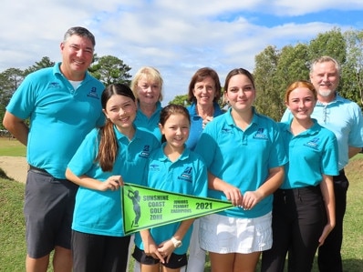 Surrounded by parents and team officials, the Noosa 3 team of (from left) Sunday and Coco Moore and Jasmine Lena, celebrate their win.